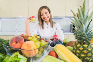 Kitchen,With,Vegetables,And,Fruits.,The,Girl,In,The,Kitchen